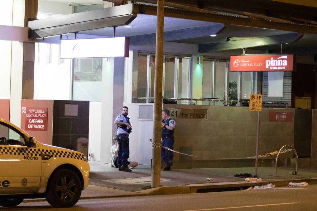 CRITICAL: A 19-year-old man is in intensive care after falling 18 metres from a Newcastle apartment balcony to the pavement below.