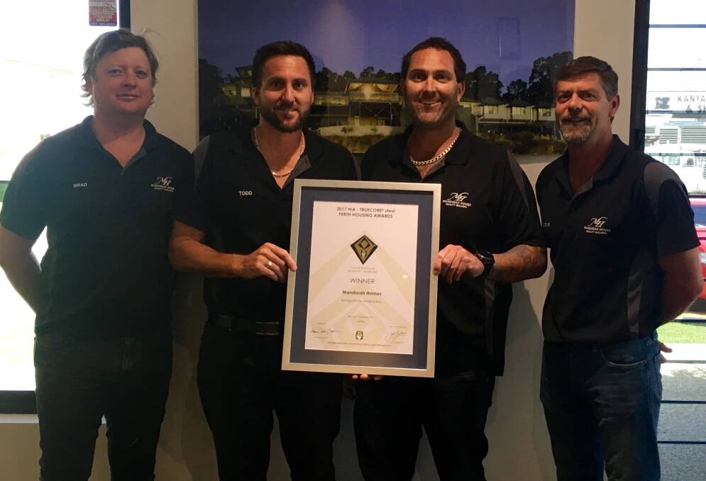Winners are grinners: Brad Powell, Todd and Darren Green and Steve Budd from Mandurah Homes celebrate their win. Photo: Supplied.

