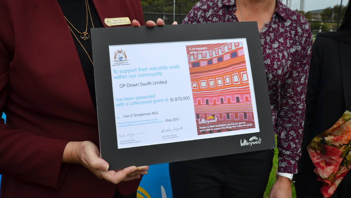 Kick starter: Murray-Wellington MP Robyn Clarke presents GP down south with Lotterywest funding for their youth health hub. Photo: Nathan Hondros.