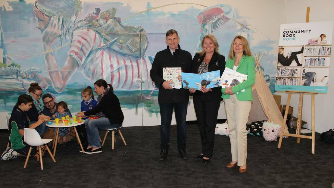 Community: Mayoral candidate Peter Jackson, Mayor Marina Vergone and Councillor Caroline Knight at the Lakelands pop-up library in July. Photo: Supplied.