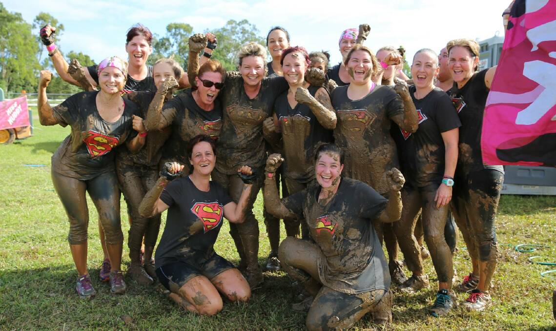 Champions: Contestants from Miss Muddy run a gauntlet of fun challenges which include swimming through mud and being jostled by sumo wrestlers. Photo: Facebook.