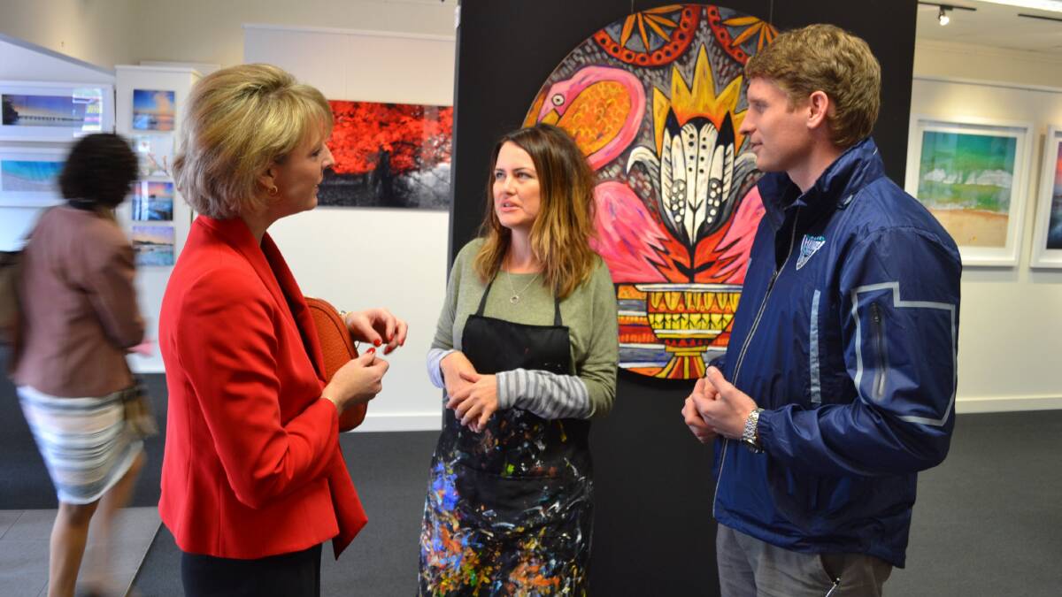 Jobs boost: Employment Minister Michaelia Cash and Canning MP Andrew Hastie (pictured with local artist Emma Blyth) have announced a massive drop in unemployment in the city. Photo: Nathan Hondros.
