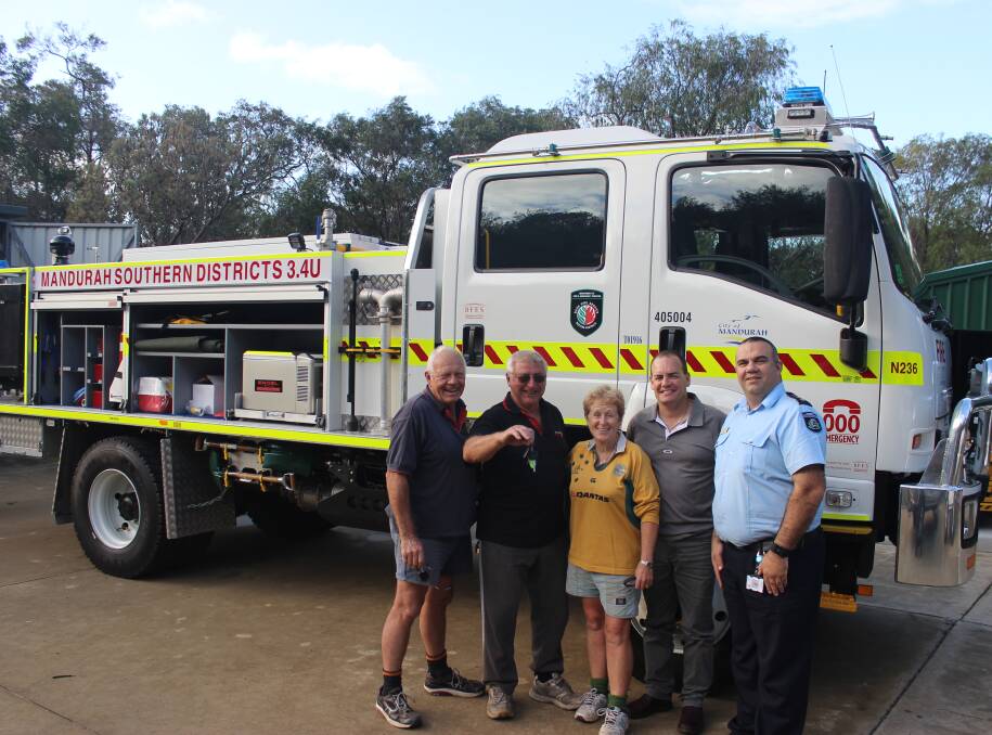 New gear: The brigade takes delivery of new firefighting appliance. Arthur Stanton, Allan Bennett, Pam Bennett, Christopher Mackey and Terry Wegwermer. Photo: Supplied