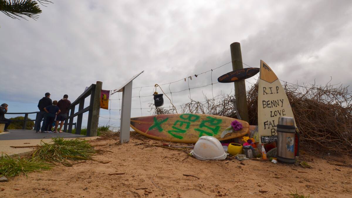 A beachside memorial to Ben Gerring stands near Falcon Beach. Photo: Nathan Hondros.