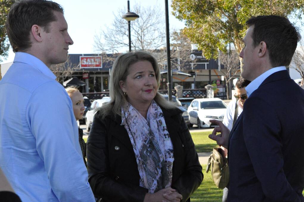 Announcement: Mr Hastie, Mayor Vergone and Mr Porter on the eastern foreshore Sunday discussing the plan for random drug tests of welfare recipients. Photo: Kate Hedley.