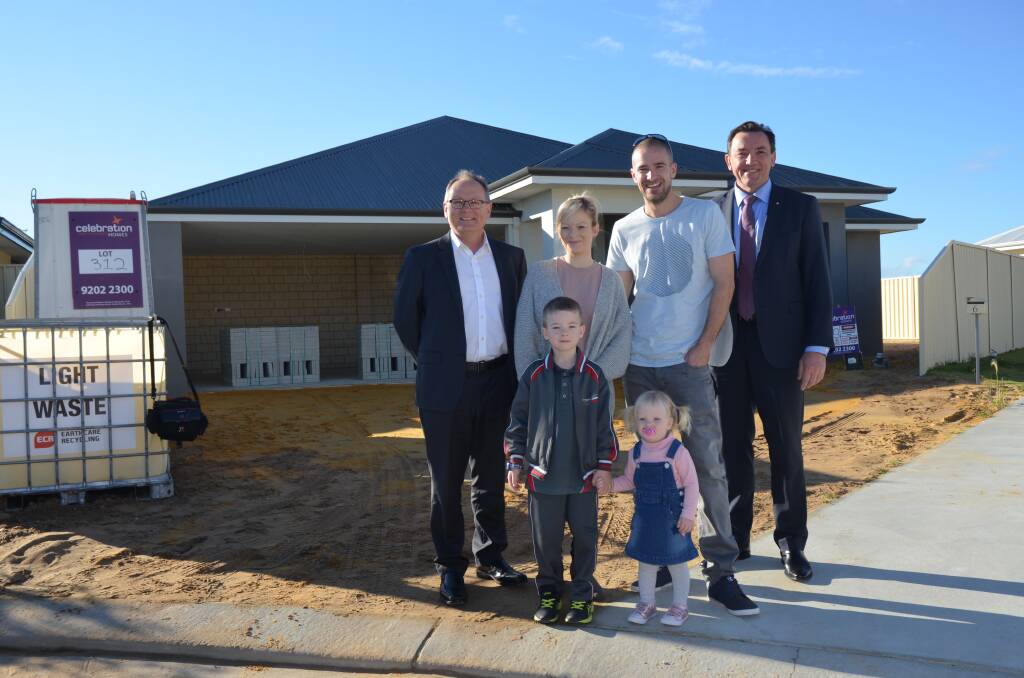 Home owners: Mandurah MP David Templeman, Lisa and Richard Smith, their children Liam and Aliyah and Housing Minister Peter Tinley. Photo: Supplied.