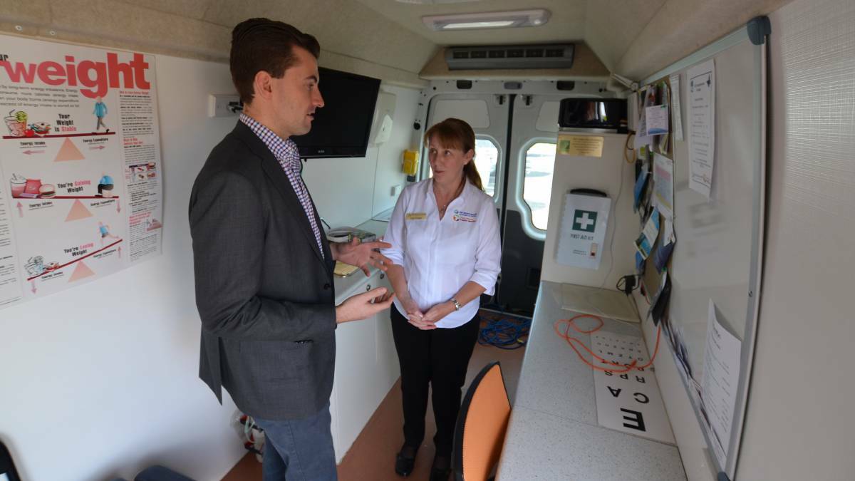 Opposition spokesman Zak Kirkup and GP down south program coordinator Gail Frater inspect the Peel Mobile Health Service van. Photo: Nathan Hondros.