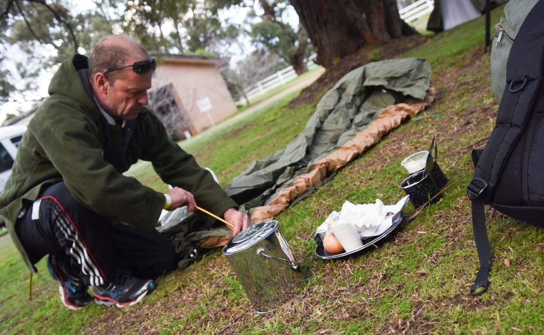 Helping hand: Mandurah councillor Dave Schumacher during Homestead for Youth's sleep-out initiative in August 2016. The organisation has carried out several fundraisers to secure a bond for their Meelon property. Photo: Marta Pascual Juanola. 