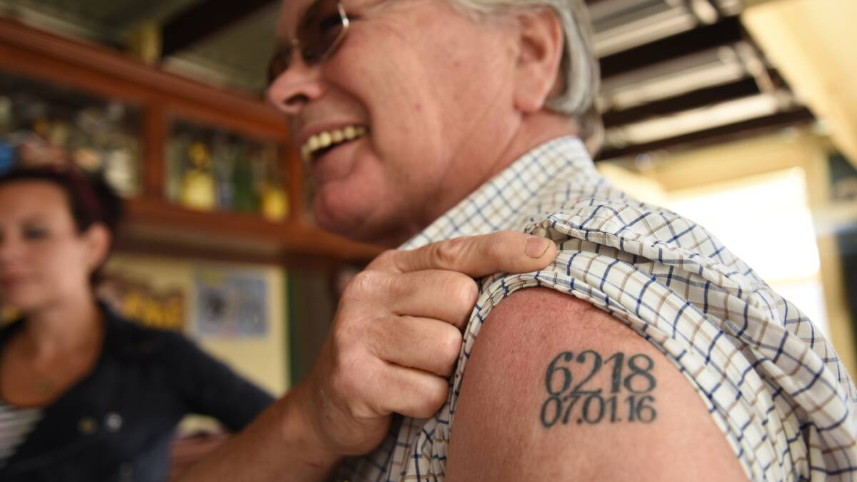 Mike Brown's new tattoo - Yarloop's postcode and the date the historic town burnt down. Photo: Marta Pascual Juanola. 