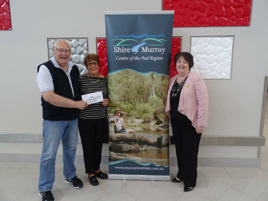 Reward: Murray residents Geoffrey and Jeanette MacDonald will with Shire president Maree Reid. Mr and Ms MacDonald will get their full rates back. Photo: Supplied.