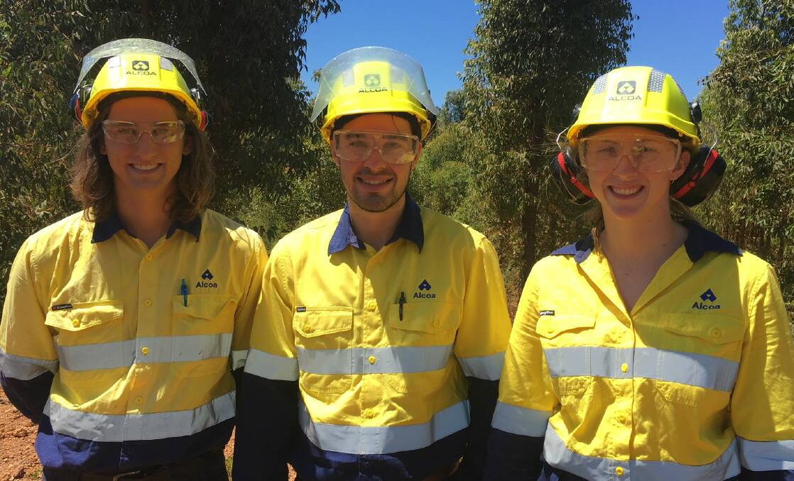 Chemical engineering graduate Brendan Farrell (left) joined
Mandurah residents Mason Carr and Mara O’Grady on a tour of Alcoa’s Huntly mine site. Photo supplied. 