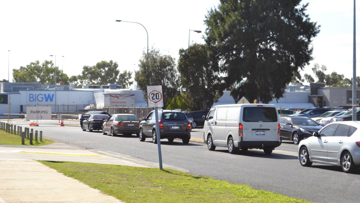 Traffic banked up for the Forum car park off Pinjarra Road. Photo: Jess Cockerill.
