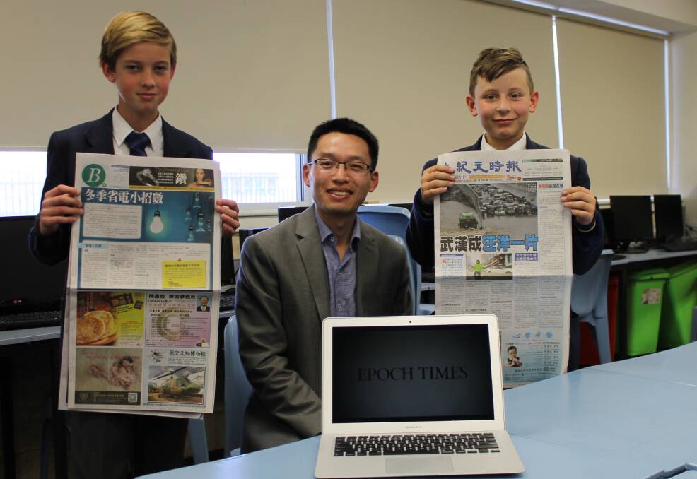 Mandurah Baptist College students Cambel Bowyer and Samuel Hennessey with Epoch Times account manager Frank Zhao. Photo: Supplied.