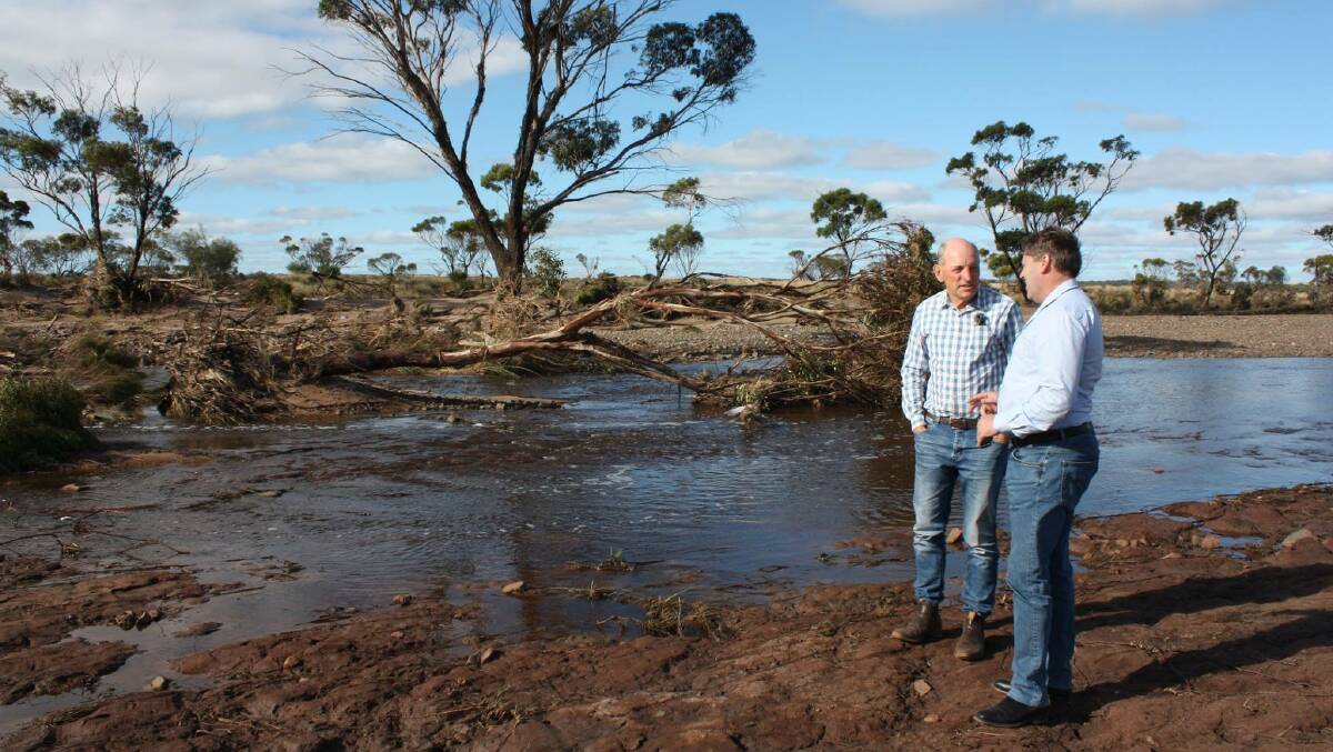 Member for Eyre Graham Jacobs and Member for O'Connor Rick Wilson inspecting the damage to local roads. Photo: Supplied.