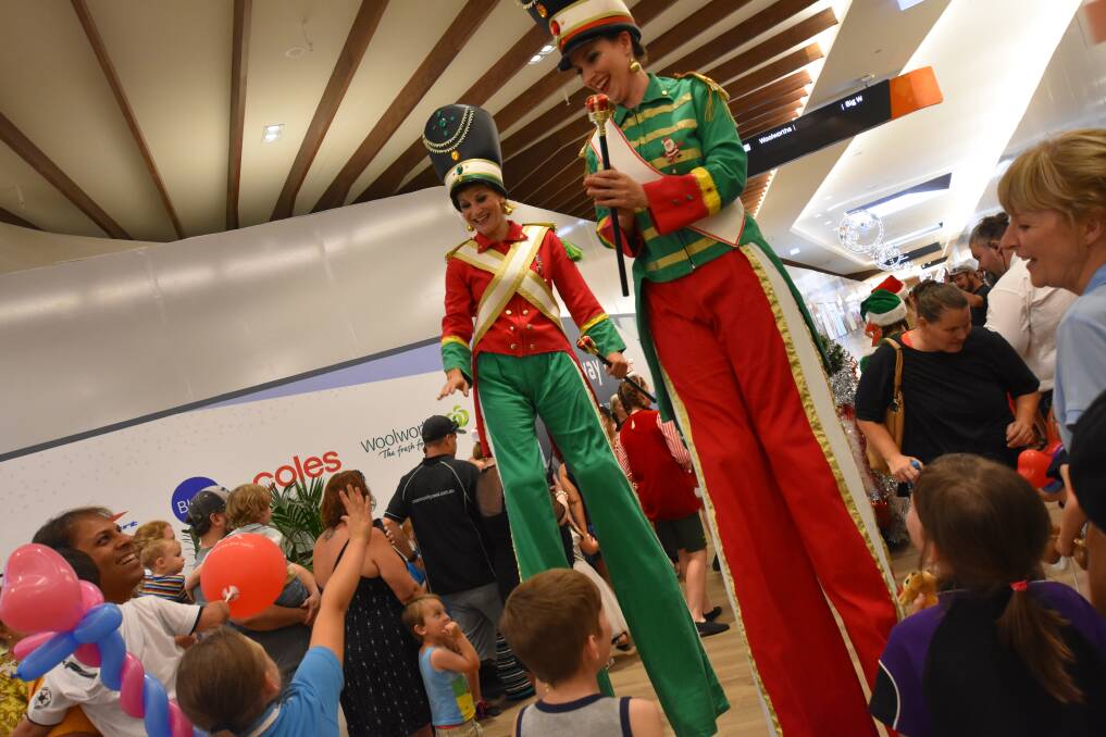 Performers entertaining children at a previous event. Photo: Caitlyn Rintoul.