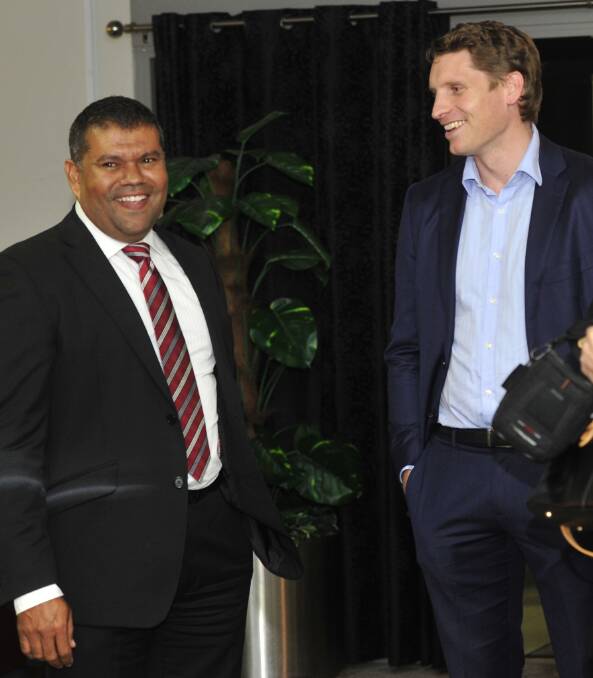 All smiles: Labor candidate for Canning Barry Winmar and Liberal Member for Canning Andrew Hastie at the meeting on Thursday night. Photo: Richard Polden.