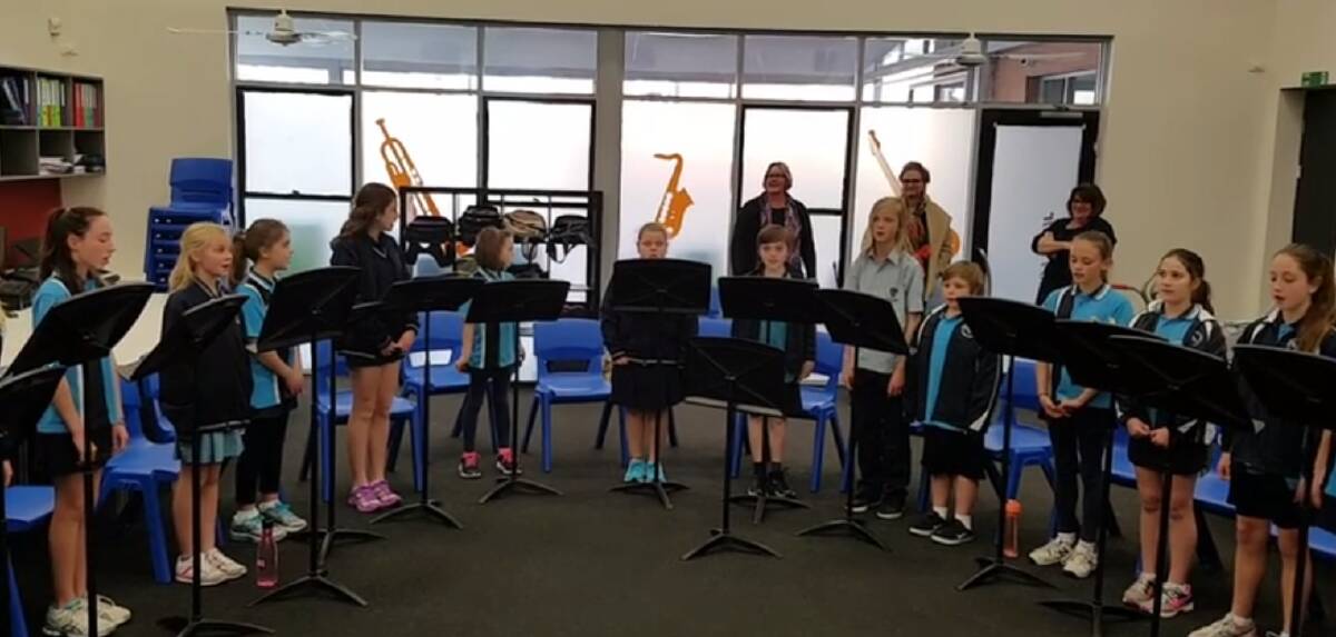 Sing a song: South Halls Head Primary and Halls Head College students practice for Opera Australia's visit. Photo: Facebook/MPAC.