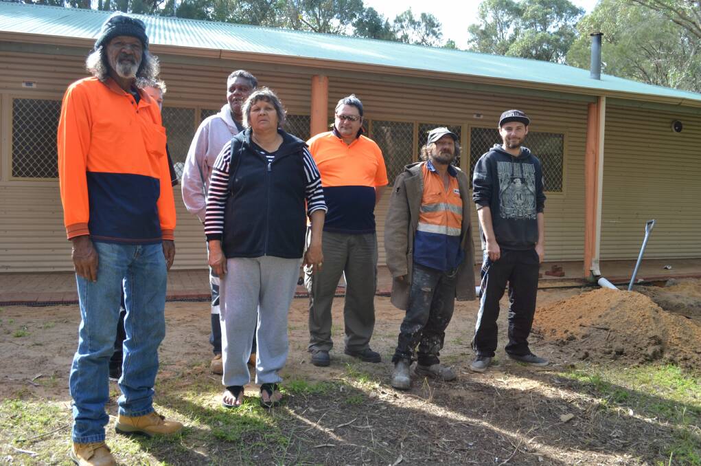 Lease of life: Frank Nannup, Communicare supervisor Warren Davis and Shirley Viti with Salvation Army workers in front of the Winjan Centre. Photo: Cam Findlay.