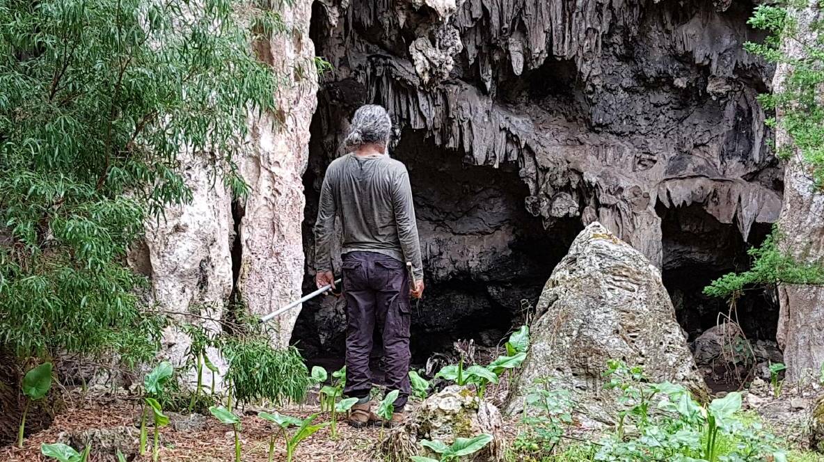 Traditional custodian of the South West Wayne Webb at the entrance to Waljin Mia (Rainbow Cave). Photo by David Guilfoyle.