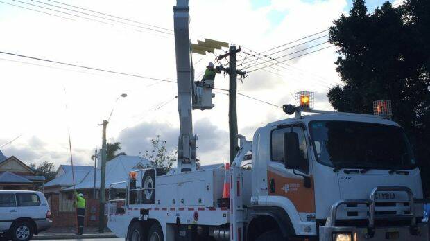 Western Power crews working to restore power to 25,000 homes. Photo: Western Power