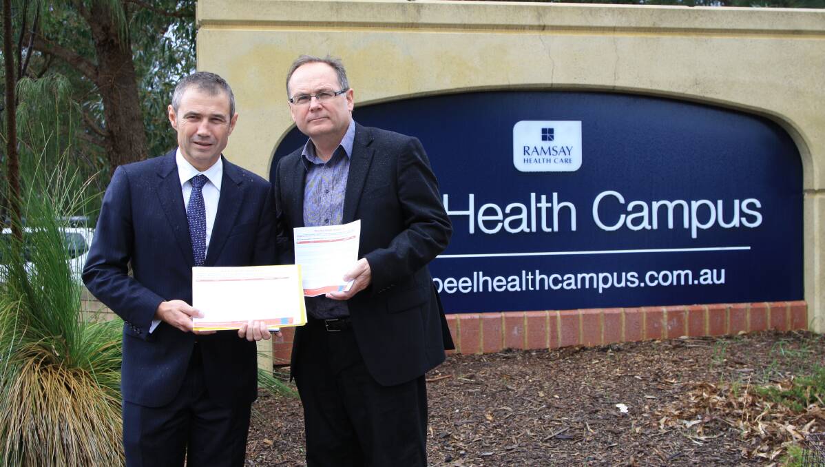 Roger Cook and David Templeman at the Peel Health Campus in 2014. Photo: Amy Martin. 