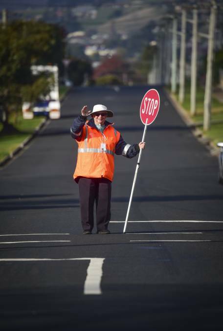 WON'T STOP: Helene Hamilton has been a crossing guard for 30 years in Devonport, assisting school students to get safely to school and hopes to continue for years to come. Picture: Paul Scambler.
