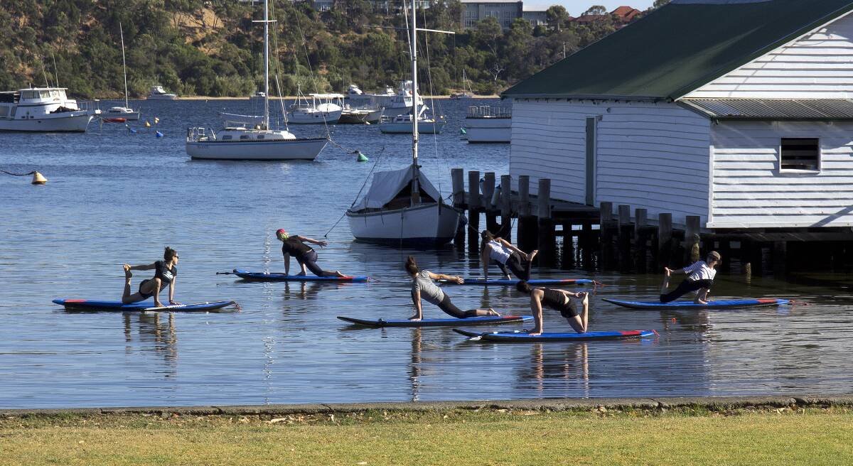 SUP yoga is growing in popularity. Photo: Supplied.