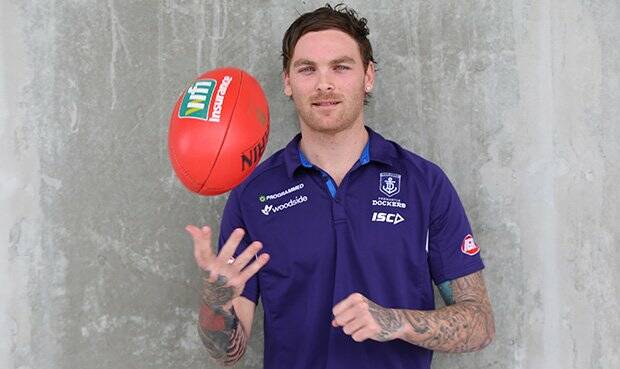 Nathan Wilson found out about his trade from a Freo fan on his flight. Photo: Twitter/Fremantle Dockers.