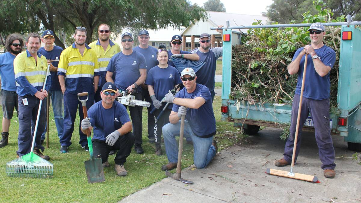 Alcoa workers pitch in to help out their local community by giving Greenfields Primary School a face lift. Photo: supplied.