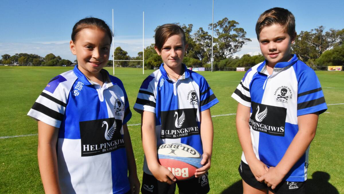 Indianna Timms, Chloe Thomas and Daniel McShane are looking forward to junior rugby season with the Pirates. Photo: Justin Rake.