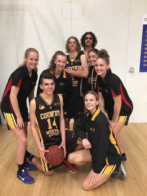Sophie Clancy, Cousteau Kyle, Ella Sigley, Jeremy Carrati, Marshall Kearing, Grace Lawler, Georgia Adams and Brie Ritchie are preparing for the under 16s Australian basketball tournament. Photo: Anita Dearle.