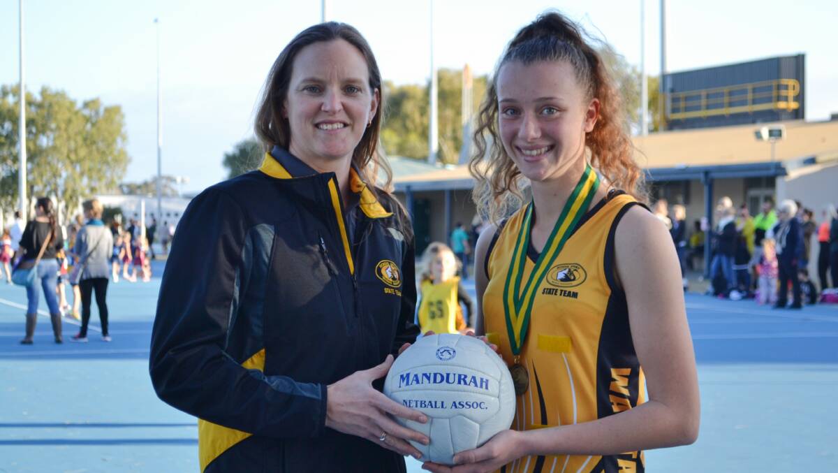 Ella Sigley (right), pictured with Phillipa Whitney, helped WA claim gold at the under 15s nationals in 2016. Photo: Justin Rake.    