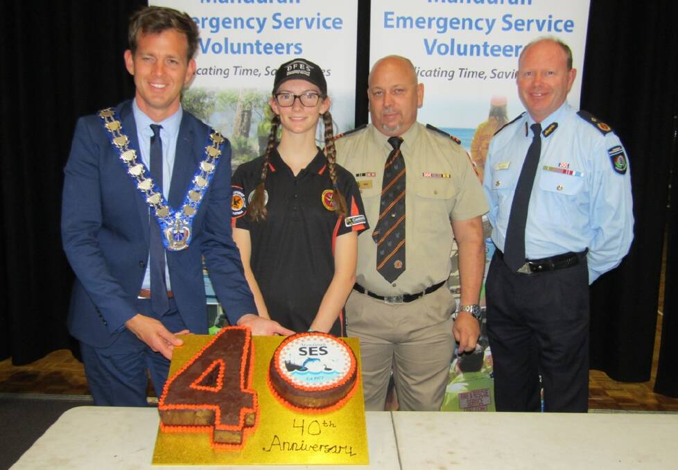City of Mandurah mayor Rhys Williams, Mandurah SES cadet of the year Amy Calleja, member of the year Phil Bresser and Department of Fire and Emergency Services acting chief superintendent Paul Carr cut the 40th anniversary cake. Photo: Bec Burns/Mandurah SES.