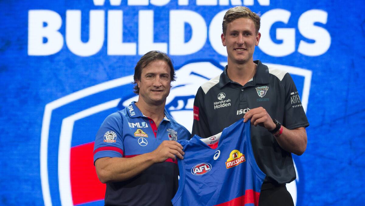 Coach Luke Beveridge will be looking for plenty out of top 10 draft choice Aaron Naughton. Photo: AAP/Craig Golding.
