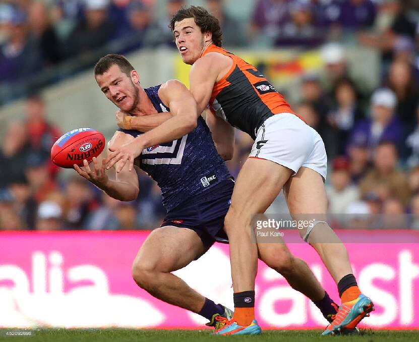 Michael Apeness, pictured playing for Fremantle against GWS in 2014, could return through Peel Thunder this week. Photo: Getty Images.