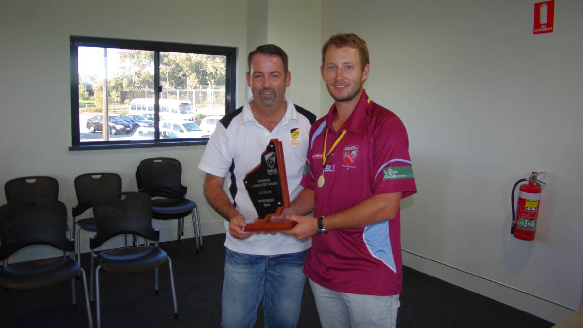 Peel captain Josh Petersen (right) receives the 2016 Senior Country Week cricket A-section trophy from Rob Marshall, Deputy Chairman, Country Cricket Board. Photo: Ken Ashwin, Farm Weekly.  