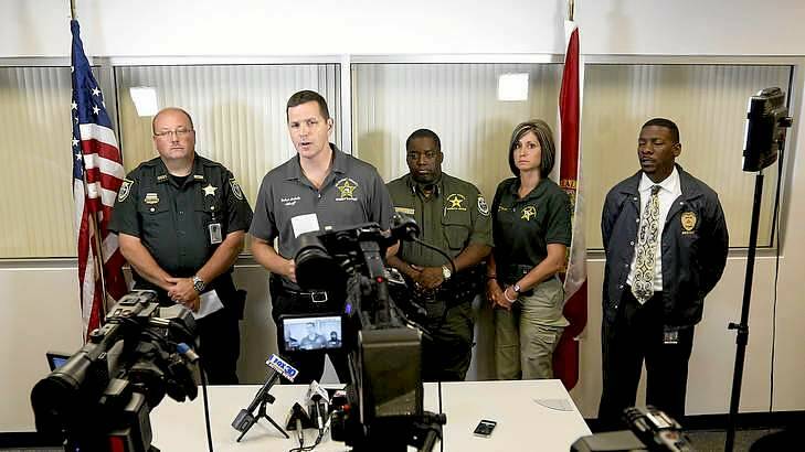 Sheriff Robert Schultz, second from left, at a news conference after the Bell shooting. Photo: Matt Stamey