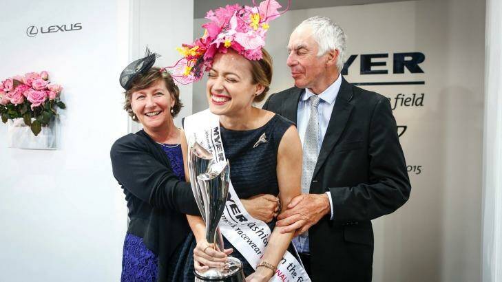 Last year's fashion on the field winner Emily Hunter with her parents, Angela and John. Photo: Eddie Jim