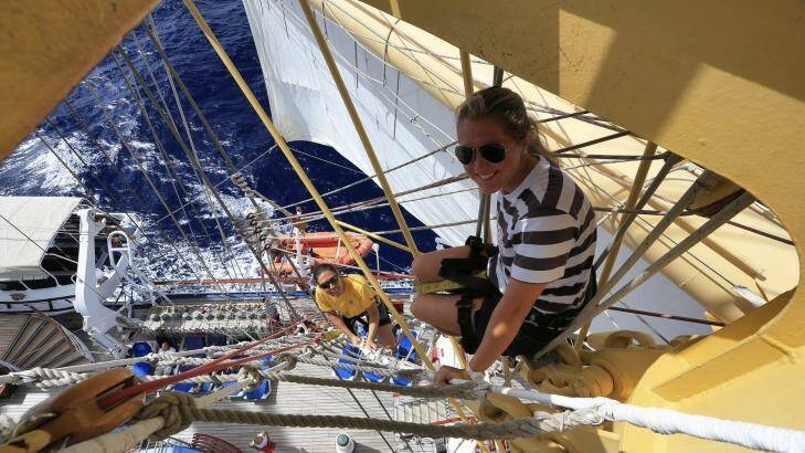 A crew member climbing the mast. Photo: Supplied