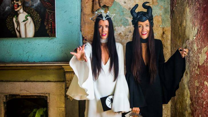 Jess (in black) and Steph Dadon, fashion bloggers from How Two Live. Halloween is coinciding with Derby Day and some designers and race-goers are getting in to the spirit with skull and crossbone jewellery, themed millinery etc.  Photo: Simon Schluter