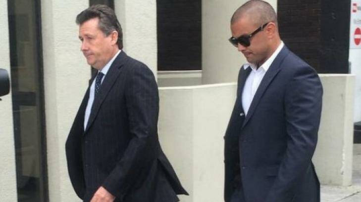 Former Eagle Daniel Kerr (right) arrives at the Perth Magistrates Court for an earlier appearance. Photo: Caitlin Barr, 6PR