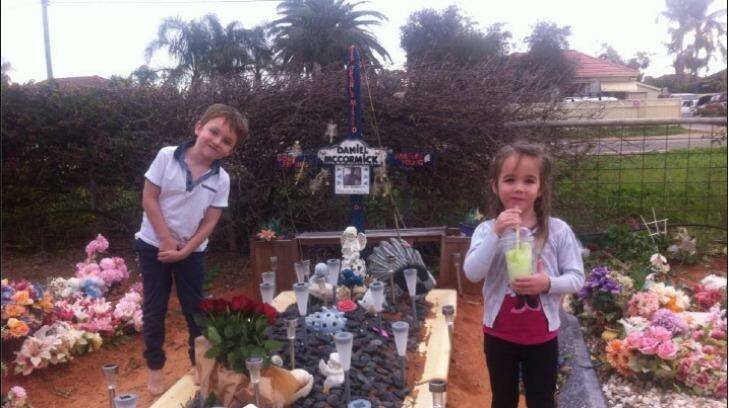 Tracy Carter was ordered to remove a hand made wooden cross from her son's grave in Geraldton. Photo: Tracey Carter