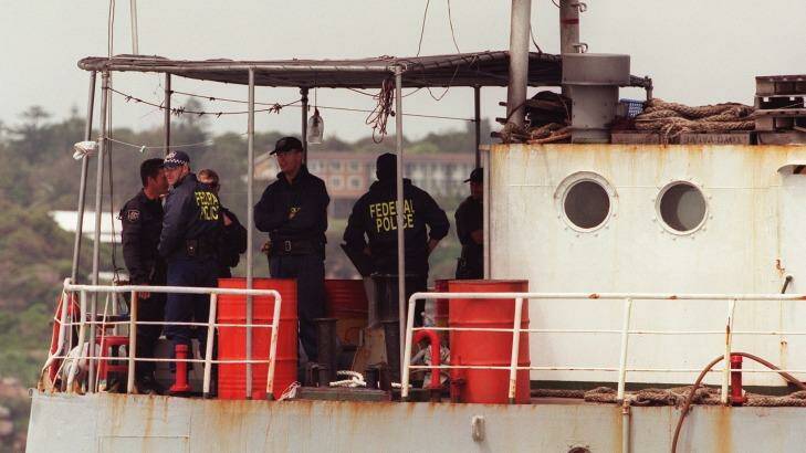 Federal police on board  the freighter Uniana.  Photo: Rick Stevens