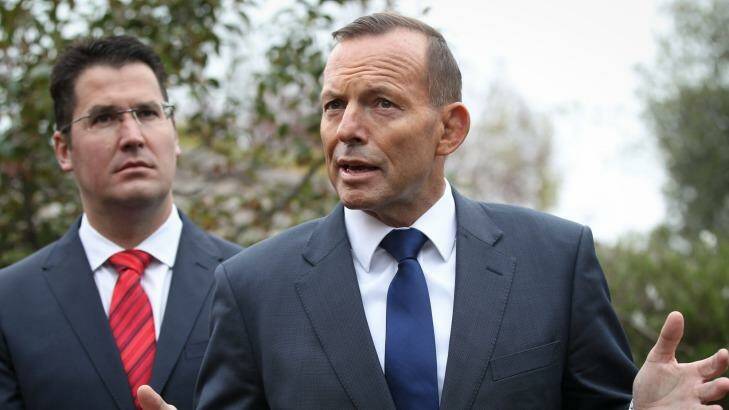 At odds? Senator Zed Seselja, left, and Prime Minister Tony Abbott. Photo: Alex Ellinghausen