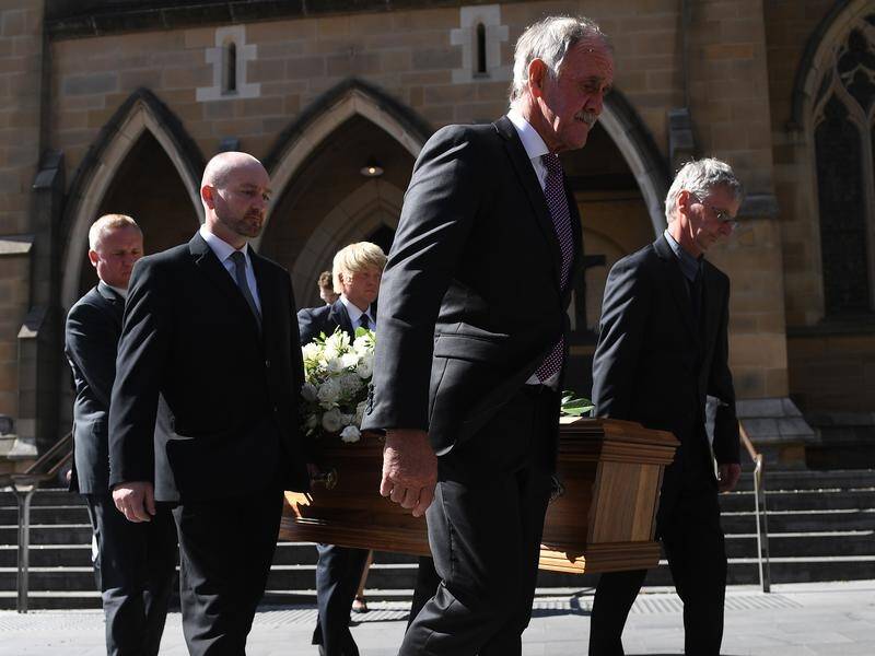 Pallbearers carry Vanessa Goodwin's casket from St. David's Cathedral at her funeral in Hobart.