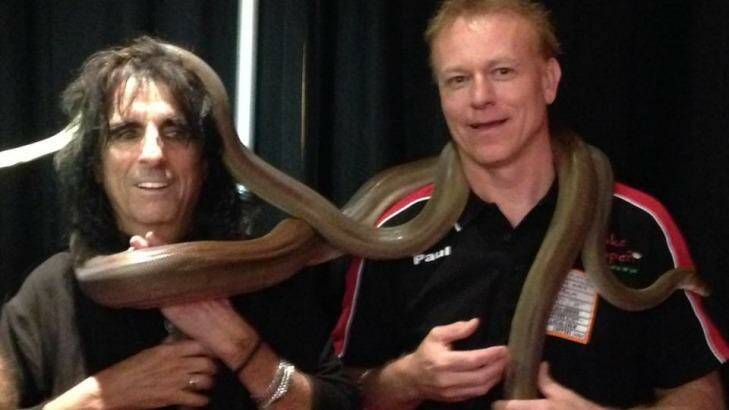 Paul Kenyon with another famous snake handler, rocker Alice Cooper. Photo: The Snake Whisperer, Facebook