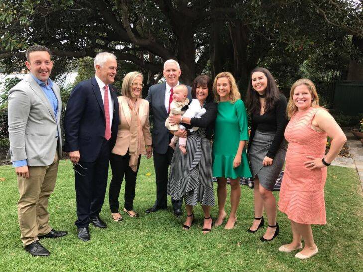 Malcolm Turnbull and wife Lucy, with Mike Pence and wife Karen (holding Malcolm Turnbull's granddaughter Alice) at Kirribilli House on Saturday April 22 2017. With Turnbull's daughter Daisy (far right) and her husband James Brown (far left), and Pence's daughters Charlotte and Audrey.??  Photo: Twitter: Malcolm Turnbull