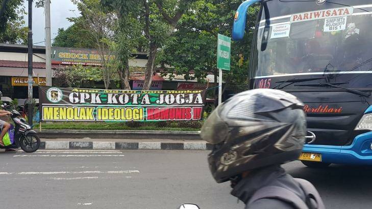 Indonesian crackdown: banner reads 'Reject communist ideology'. Photo: Amilia Rosa