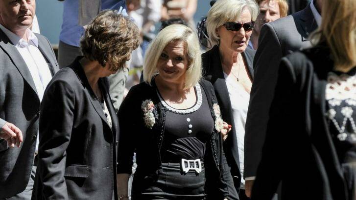 Harris' daughter Bindi Nicholls (centre) is among those who have signed the petition  Photo: Niklas Halle'n