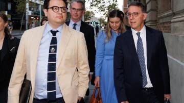 David Sharaz (left) tweeted he would no longer fight the defamation case because of the cost. (Richard Wainwright/AAP PHOTOS)